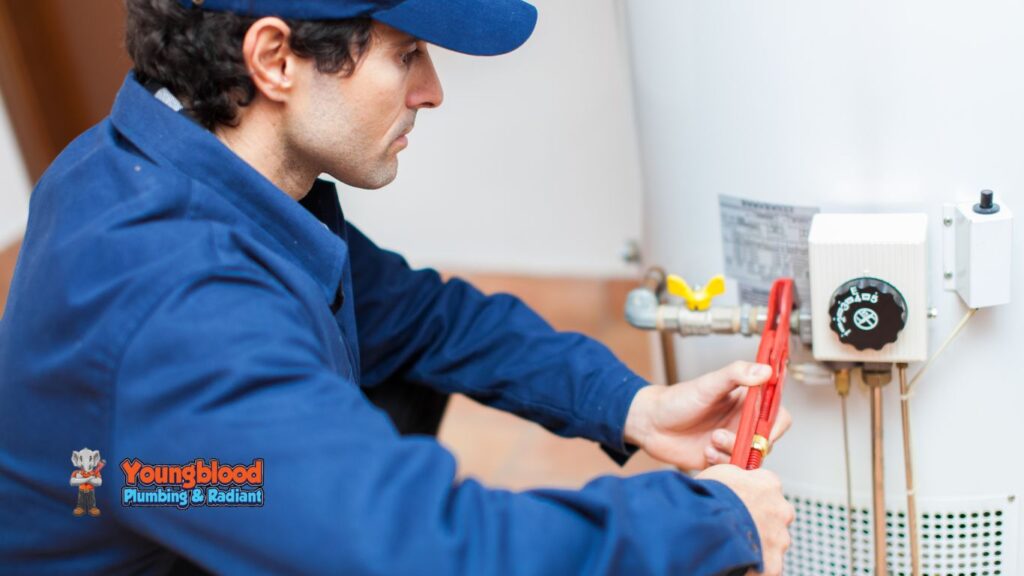 A man working on water heater repair