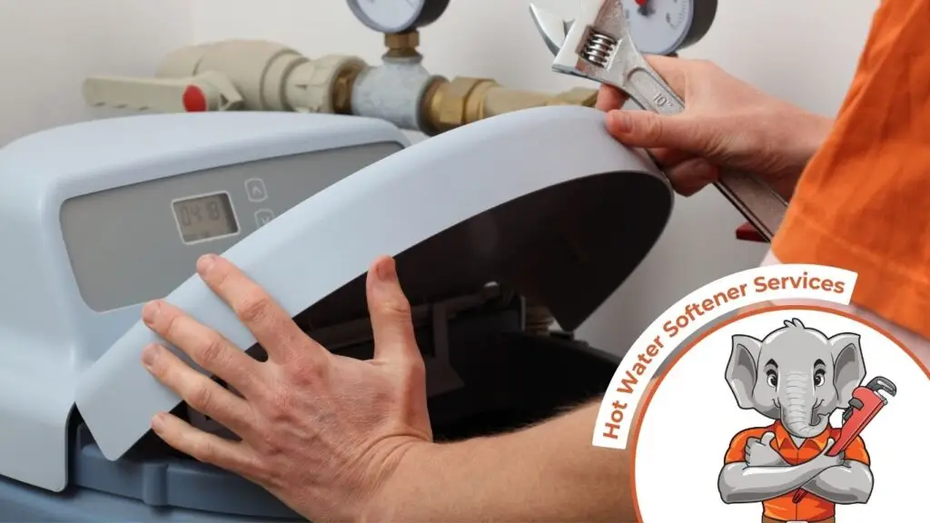 Man fixing a hot water Water softener