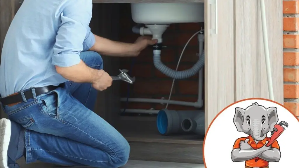 sumner plumber at work fixing a sink pipe